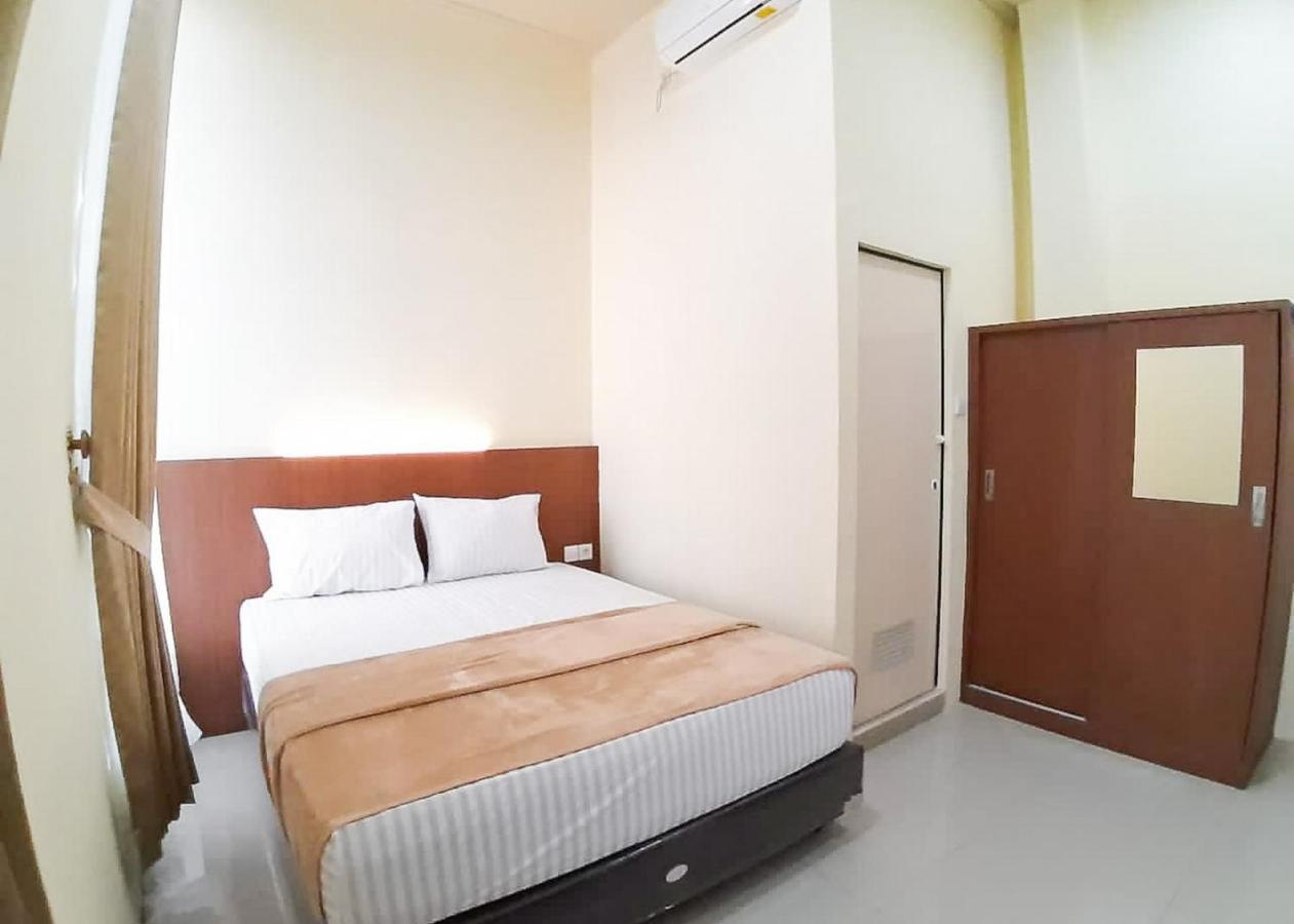ホテル Reddoorz Syariah Near Transmart Jambi 2 Palmerah エクステリア 写真